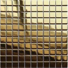 a close up view of some gold colored tiles