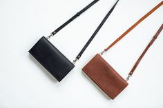 "Look at this amazing bifold leather crossbody wallet, purse for women. It will easily contain your passport and phone, a lot of cards, paper money and coins. Such leather women's clutch is ideal for travel or as your favorite handmade everyday's wallet. All slots are of right size for cards and money. You will not feel any discomfort putting in or getting them out. Leather shoulder strap allows you to carry it very easy. This wonderful stylish crossbody wallet will suit you for all occasions - for a holiday, trip, or for a business lunch. Description:  - removable regulated shoulder strap  - removable wrist strap -  one zippered compartment inside  - 9 card slots - 2 big pockets (for passport or other essentials) - one big compartment for a iphone - magnetic buttons closure Wallet dimensi Crossbody Wallet Purse, Handmade Leather Clutch, Purse Handmade, Purse For Women, Ladies Clutch, Crossbody Wallet, Money Clip Wallet, Travel Wallets, Phone Wallet