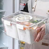 a woman holding a plastic container filled with food in front of an open refrigerator door