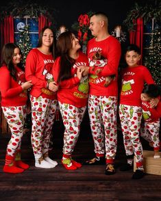 Celebrate the magic of the season with our Merry Grinchmas Family Matching Pajama Set! This delightful set features a vibrant red top showcasing a playful holiday graphic that reads "Merry Grinchmas," perfect for spreading cheer. The coordinating pants boast a white base adorned with whimsical holiday characters, making it an ideal choice for family gatherings, cozy movie nights, or festive celebrations. Key Features: Soft and Comfortable: Crafted from a cozy cotton blend, these pajamas provide