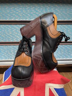 "Absolutely stunning pair of 70s Glam rock platform shoes. Noddy holder from Slade would have been proud of these beauties 👌. Made by a famous name of the time \"Kingsway\" that made many a different styles around this time. Mainly black leather upper with light tan and darker brown platform sole and heel that seems to be formed of one kinda Crepe rubber block with lovely stitching detail on both sides and the rear,these will not wear down and will last many more years,the shoes themselves have not been worn much and are in outstanding condition. Heel measures near 5\" inches high and the sole at widest point is just over 2\" inches. Fits a uk size 8 USA 9 Euro 42. Please check out my other vintage pieces  My Generation vintage on instagram and facebook" 70s Fashion Vintage, 70s Glam Rock, 1970s Glam, Giuseppe Zanotti Boots, Noddy Holder, 70s Glam, Vintage Ysl, Vintage Mom, Glam Rock