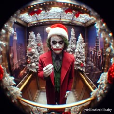 a man dressed as the joker in a christmas scene