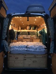 the back end of a van filled with furniture