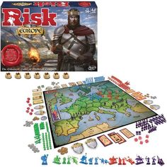 a board game with pieces in front of it and an image of a knight on the map