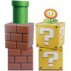 two blocks with question marks on them and a flower in the middle one block is yellow