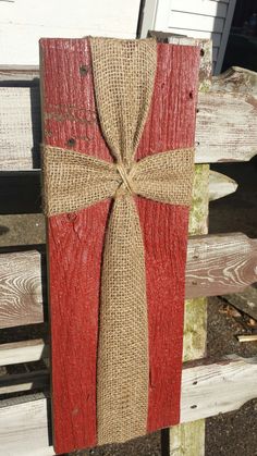 a piece of wood that has been tied with burlock and is sitting on a bench