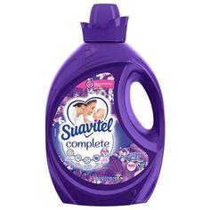 a bottle of swartel complete laundry deterant on a white background with purple flowers