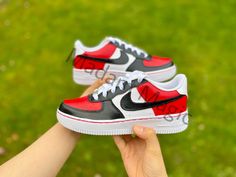 * Hand painted custom Air Force 1 07 Low * Not vinyl, stickers or patches * No returns, refunds or exchanges * Processing time is 2-3 weeks * I cannot expedite orders or make for a specific date * Delivery time depends on country * Cancellations up to 24 hours after purchase * Please try on shoes in a store to make sure you order the correct size * Please order correct size - if you order incorrect size this is your own responsibility * If you order a women's size it is possible you receive the men's option of the same size -the shoes will be the same only the number on the box will differ * Wipe clean only, no washing or picking * Shoes are 100% genuine and can be proven so * Shoes are bought from a genuine retailer, copy of original receipt of purchase can be provided upon request * If y Black Casual Sneakers With Custom Logo, Casual Red Customizable Sneakers, Custom Black Low-top Sneakers, Custom Red Sneakers With Round Toe, Customizable Red Sneakers With Round Toe, Customizable Red Sneakers, Custom Black Sneakers For Sports, Customized Low-top Sporty Sneakers, Custom Red Sneakers For Streetwear