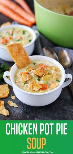 chicken pot pie soup in a white bowl with crackers on the side