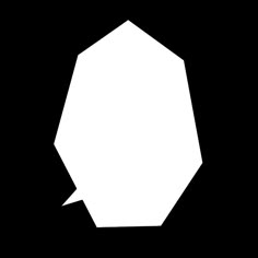 a black and white photo of an origami style object on a dark background