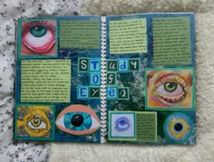 an open book with pictures of eyeballs and words written in cursive writing