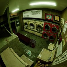 an overhead view of a laundry room with washers and dryers