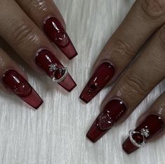 Older Nail Designs, Prom Nails Dark Red, Burgundy Nails With Gems, Red Gel X Nail Designs, Red Vivienne Westwood Nails, Dark Red Nails With Charms, Red Emo Nails, Blood Red Nails Design, Dark Red Acrylic Nails Design