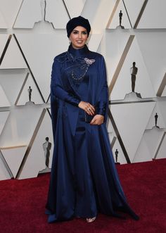 an image of a woman in blue on the oscars red carpet