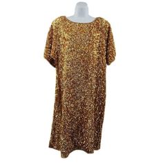 Vintage Gold Silk Dress Hand Embellished with Gold Beads and Sequins | Joseph Le Bon | Circa 1980s-1990s This vintage gold silk dress by Joseph Le Bon is hand-embellished with intricate gold beads and sequins, making it a true statement piece. Perfect for special occasions, this dress features elegant detailing and a flattering fit. While there is some light bead loss around the hem and collar, it remains in good vintage condition. Details: Brand: Joseph Le Bon Era: Circa 1980s-1990s Tag Size: XL Measurements (laying flat): Armpit to armpit: 22" Waist: 20" Hips: 23" Length: 38" Condition: Good vintage condition with minor bead loss Materials: Silk, hand-embellished with gold beads and sequins Care Instructions: Wash inside out in a fine mesh laundry bag on a delicate cycle or handwash gent Gold Silk Dress, Gold Beaded Dress, Silk Dress Vintage, Vintage Beaded Dress, Gold Silk, Silk Material, Beaded Dress, Gold Dress, Dress Clothes For Women