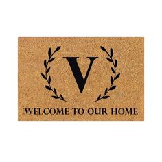 a welcome mat that says welcome to our home with an image of the letter v on it