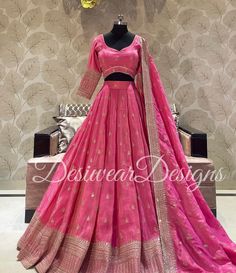 Made to Order/Measurement/Custom Order Lehenga - Color : rani pink - Fabric : Embroidered  tishu silk - Fully flared paneled lehenga - Embroidered  Blouse -  Net Dupatta with Gold Border - Drawstring closure with Tassels - - It can be customize in any design or size  PLEASE NOTE: BUYERS ARE RESPONSIBLE FOR ANY CUSTOMS AND IMPORT TAXES THAT MAY APPLY. This is a made to order product. If you opt for 'Made To Measurement Option', we will provide a measurement template and you can share the measurements likewise. If you want to opt for 'Standard Size', Please refer to the size chart provided in the listing. Shipping: Standard Shipping is done by DHL ecommerce and it mostly takes 2 to 3 weeks to deliver after dispatch. Express Shipping is done by DHL express and it mostly delivers within a week Tissue Fabric Lehenga, Fitted Silk Lehenga With Dori Work, Elegant Traditional Wear With Dori Work For Ceremony, Elegant Pink Cutdana Lehenga, Pink Dola Silk Dress With Zari Work, Pink Tussar Silk Lehenga With Cutdana, Pink Raw Silk Dress With Gota Work, Pink Tussar Silk Lehenga With Cutdana Detail, Pink Lehenga In Tussar Silk With Cutdana Details