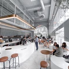 people are sitting at tables and eating in a restaurant with lots of windows on the ceiling