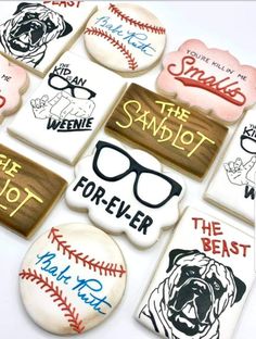 decorated cookies with different types of baseballs and dogs on them, including one for the sandlot