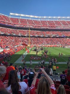 a football stadium filled with lots of people