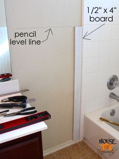 a bathroom with measurements for the bathtub and shower