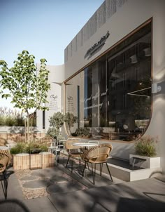 an outdoor seating area with tables and chairs