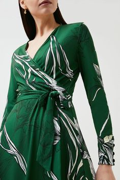 Stencilled With A Pencil-Drawn Floral Print, This Ethereal Midi Dress Is A Wearable Work Of Art. Its Slinky Jersey Fabric And Waist-Defining Tie Ensure It Flatters Any Figure - Add Strappy Stilettos To Dress It Up For Date Night. Elegant V-neck Maxi Dress With Abstract Print, Elegant Floral Print Wrap Dress, Green Printed Evening Dress, Spring Printed Fitted Wrap Dress, Elegant Floral Print Midi Wrap Dress, Spring Fitted Printed Wrap Dress, Elegant Floral Midi Wrap Dress, Elegant Long Sleeve Dress With Abstract Print, Spring V-neck Maxi Dress