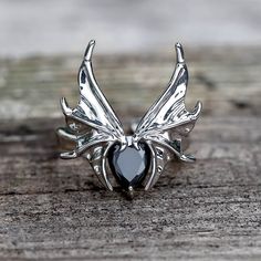 Embrace the darkness with our Dark Bat alloy adjustable ring. This unique accessory features a captivating bat design, crafted with meticulous attention to detail. Collectible Gothic Rings For Halloween, Bat Wedding Ring, Bat Ring Jewelry, Embrace The Darkness, Bat Ring, Bat Pendant, Bat Design, Gothic Ring, Fan Style