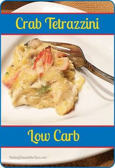 a white plate topped with food on top of a blue and red sign that says crab tetrazzini low carb