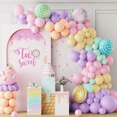 a birthday party with balloons, cake and decorations