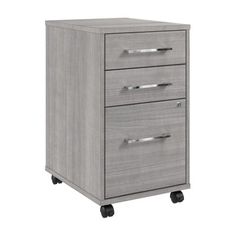 an office filing cabinet with wheels and drawers on casteors, in grey oak finish