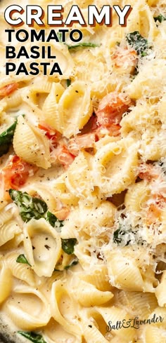 this creamy pasta is loaded with tomatoes, spinach and parmesan cheeses