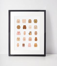 an art print with different types of bras in black frames on a white wall