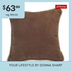 a brown pillow with white trim on it and the price is $ 6, 99