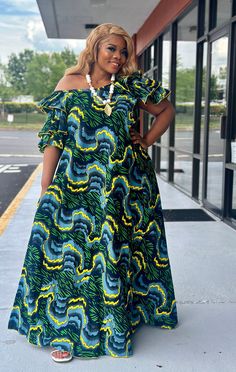 ✨ Step into elegance and comfort with our trending Ankara maternity gown.  ✨ The striking Ankara African Dress is expertly tailored to accentuate your beautiful curves while providing ample room for your growing belly. Its flowing silhouette drapes gracefully, offering both style and ease as you navigate through each trimester. Crafted from vibrant African print fabric, this long maxi dress is a celebration of culture and motherhood. Designed with the modern African woman in mind, this maternity gown exudes confidence and sophistication.  ✨ Whether attending a special occasion or simply embracing your everyday chic, this Ankara Maternity Gown is the epitome of effortless glamour. Embrace tradition with a contemporary twist and embrace your maternal glow with every step you take. The plungi Africa Long Dress Style, Summer Maternity Long Dress, Long Summer Maternity Dress, Long Maternity Summer Dress, Traditional Dresses For Women, Green Maxi Dress For Maternity, Maternity Maxi Gown For Summer, Flowy Maternity Maxi Dress, Maternity Dresses With Ruffles