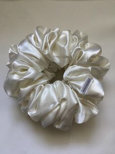 XX Large hair scrunchie, Bridal scrunchie , double scrunchie material:White satin. Medium weight fabric. double elastic, firm comfortable hold. size: approximately 4.5-5 by 4.5-5 inches by 3 inches in depth. hand made in Australia. Bridal Scrunchie, Hair Tie Scrunchies, White Scrunchie, Silk Scrunchies, Scrunchies Hair, Barrette Clip, Hair Tie, White Satin, Pretty Jewellery