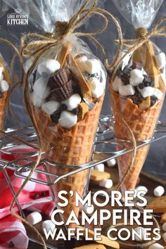 three cones filled with marshmallows and chocolate