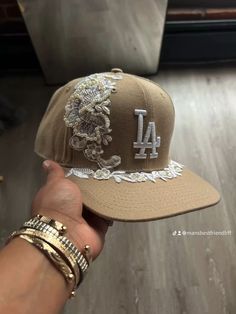 Custom fitted hat with embroidered embellishments lace and pearly accessories streetwear la mbf Fitted Hats Custom, Accessories Streetwear, Thrift Flip Ideas, Embroidered Embellishments, Swag Hats, Streetwear Hats, Dodger Hats, Crocs Fashion