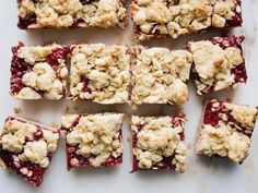 several squares of food sitting on top of a table