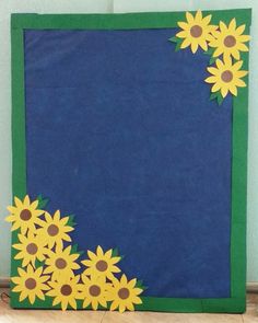 a bulletin board with sunflowers painted on it