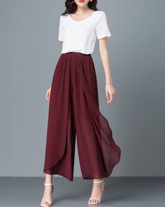 * Wide-leg skirt-shaped pants spun with high-quality chiffon fabric. * Elastic waistband and A-line shape, make you look more taller and thinner. *Material: 100% chiffon *Let us know your regular size and overall height in your country. *The waist size and length can be customized. *Size: True to US size, can provide US 0 to US 20 , you can tell us your usual size and height when ordering. * Shipping: Free shipping Processing time: 5-7 working days Delivery time: 7-20 working days Chic High Waist Flowy Bottoms, Elegant Harem Pants With Elastic Waistband, Elegant Stretch Harem Pants With Elastic Waistband, Elegant Full-length Loose Fit Harem Pants, Elegant Solid Pants With Wide Waistband, Elegant Pants With Wide Waistband, Elegant High-waist Flowy Bottoms, Elegant Flowy Solid Bottoms, Elegant Flowy Bottoms For Party