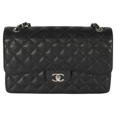 Listing Title: Chanel Black Caviar Jumbo Classic Double Flap Bag SKU: 128682 Condition: Pre-owned Condition Description: A timeless classic that never goes out of style, the flap bag from Chanel dates back to 1955 and has seen a number of updates. The design was revolutionary for its time, giving its wearers the freedom to carry their everyday must-haves without the cumbersome nature of a larger bag. The bag features the classic leather-entwined chain-link shoulder strap for a distinctive aesthe Davao, Chanel Model, Chanel Caviar, Black Caviar, Shoulder Bag Black, Chanel Black, Large Bag, Classic Leather, Flap Bag