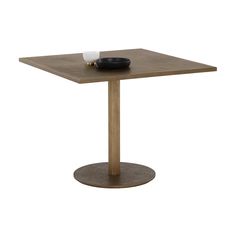 a square wooden table with a black bowl on top