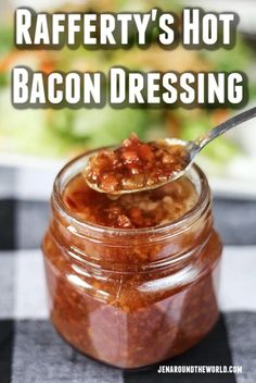 a jar filled with bacon dressing on top of a checkered table cloth and text overlay that reads, raffery's hot bacon dressing