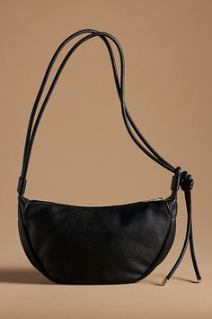 Polyurethane; polyester lining Two inner slip pockets One inner zip pocket Zipper styling Imported | Convertible Sling Bag by Mali + Lili in Black, Women's, Polyester/Polyurethane at Anthropologie Freja Nyc Bag, Large Sling Bag, Versatile Faux Leather Hobo Bag With Adjustable Strap, Versatile Faux Leather Hobo Bag Crossbody, Versatile Faux Leather Crossbody Hobo Bag, Versatile Crossbody Hobo Bag With Zipper Closure, Versatile Crossbody Hobo Bag With Zipper, Versatile Faux Leather Bag With Zipper Pocket, Everyday Waterproof Bag