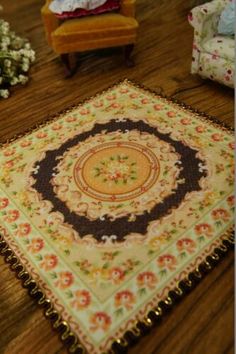 a living room with a rug on the floor