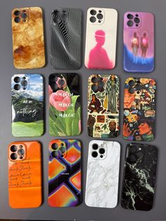 there are many cell phones that have been decorated with pictures and words on them, all lined up in a row