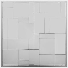 a black and white photo of squares on a wall with one square in the middle