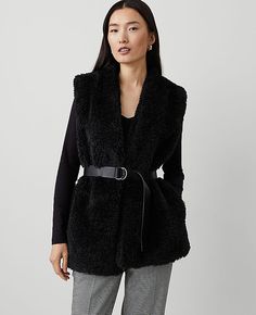 Our plush faux fur vest provides warmth and luxurious texture, while a faux leather belt cinches a flattering silhouette. V-neck. Sleeveless. Includes faux leather belt.,Hit:Hits at hip,Imported:Imported,Fit:Relaxed fit,Length:29" long,Fabrication:Faux Fur Shell: 100% Polyester; Lining: 100% Polyester; Belt: Imitation Leather,Garment Care:Machine Washable Faux Fur Belted Vest by Ann Taylor Size regular - Large Black Women's Vests, Long, Sleeve, Jackets, Faux, Fur, Shell 100%, Polyester Lining 10 Women's Vests, Faux Leather Belts, Faux Fur Vest, Faux Fur Vests, Fur Vest, Womens Vest, Large Black, Autumn Winter Fashion, Leather Belt