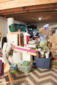 a room filled with lots of clutter and boxes on top of eachother